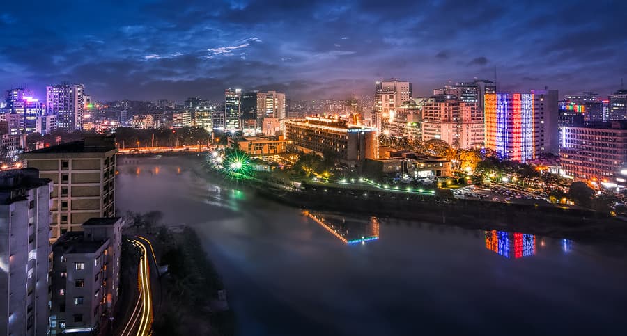 Dhaka city skyline with traffic and buildings